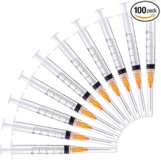 DISPOSABLE SYRINGE