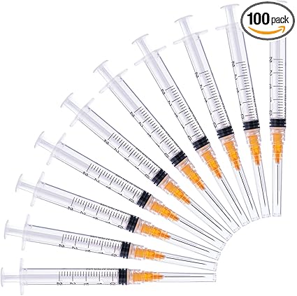 DISPOSABLE SYRINGE