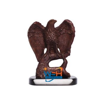 EAGLE OPEN WINGS ON TREE TRUNK