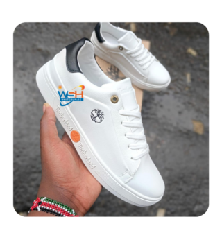 Premium quality Timberland casual shoes Stylish beige design with a white sole Embossed Timberland logo on the side and sole Comfortable and durable for everyday wear Brown leather accent on the heel for added style Perfect for casual and semi-formal outfits Available in various sizes High-quality materials ensure long-lasting use Ideal for both men and women Enhance your footwear collection with these versatile shoes