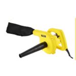 Yellow handheld electric leaf blower with a long black nozzle and powered cord, used to blow leaves and debris.
