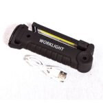 Black handheld work light with a yellow LED strip and the word WORKLIGHT, plus a USB charging cable in the foreground.