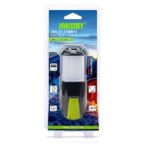 Jakemy LED flashlight in clear blister packaging with a lime-green power button on a mountain-themed display.